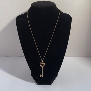 925 sterling silver, gold filled necklace and heart pendant.